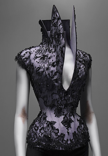 Alexander McQueen (British, 1969–2010), Corset, Dante, autumn/winter 1996–97, Lilac silk faille appliquéd with black silk lace and embroidered with jet beads, Courtesy of The Metropolitan Museum of Art, Photograph © Sølve Sundsbø/Art + Commerce