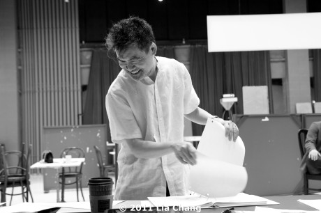 Playwright David Henry Hwang adds new pages to his script during a rehearsal for Chinglish in the Healy Room of the Goodman Theatre in Chicago on June 5, 2011. © 2011 Lia Chang