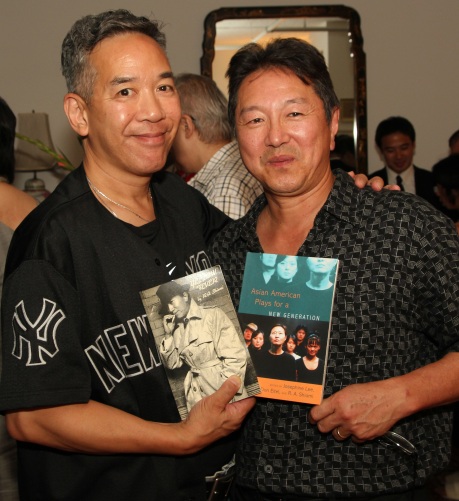 Henry Chang, noted mystery/crime fiction novelist  with Rick Shiomi, playwright, Artistic Director of Mu Performing Arts and co-editor of Asian American Plays for A New Generation, at a book party in New York on July 29, 2011. Photo by Lia Chang 
