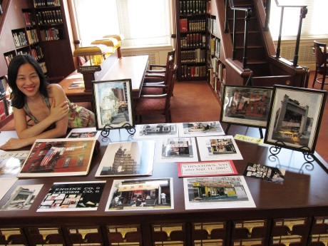 Lia Chang with her portraits of New York Chinatown after 9/11 display in the Asian Division Reading Room of the Library of Congress in the Thomas Jefferson Building in Washington D.C. on September 10, 2011.  Photo by Reme Grefalda