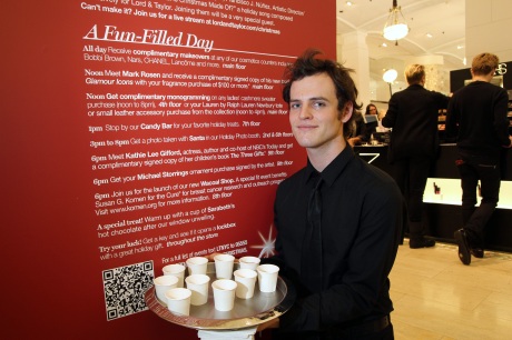 Austin serves up Sarabeth's hot chocolate after the 2011 Lord & Taylor Christmas Windows Unveiling. Photo by Lia Chang
