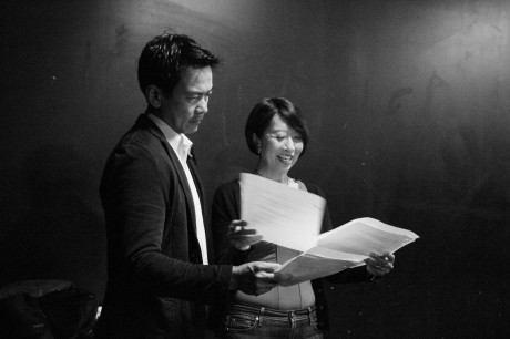 Joel de la Fuente, who portrays Gordon Hirabayashi in Hold These Truths, with playwright Jeanne Sakata in rehearsal at 440 Studios in New York on May 10, 2012. Photo by Lia Chang
