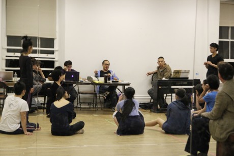 The King and I director Alan Muraoka gives notes after the runthru. Photo by Lia Chang