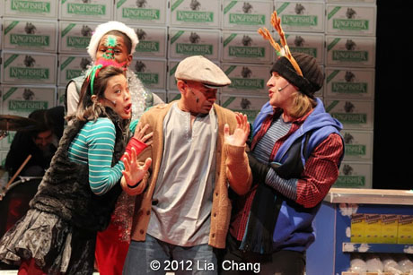 Andrew Ramcharan Guilarte as "Scroogewala" (center) with the Angel Crew (left to right: Brooke Ishibashi, Kiarri Andrews & Matthew Knowland) from LAUGHistan's World Premiere of "BUMBUG The Musical". Photo Credit: Lia Chang