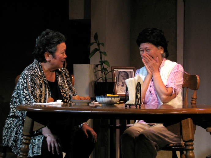 Karen Yamamoto Hackler and Dian Kobayashi in Daniel Akiyama’s A Cage of Fireflies.                  Photo credit: Sammie Choy