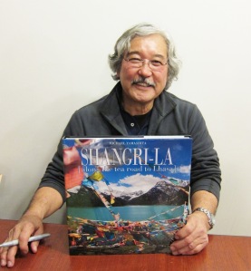 National Geographic photographer Michael Yamashita at a book signing at the Asia Society on February 21, 2013 for his new book Shangri-LA. Photo by Lia Chang