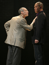 Francis Jue as HYH and Hoon Lee as DHH in David Henry Hwang's YELLOW FACE at the Public Theater in New York. (Photo by Joan Marcus)