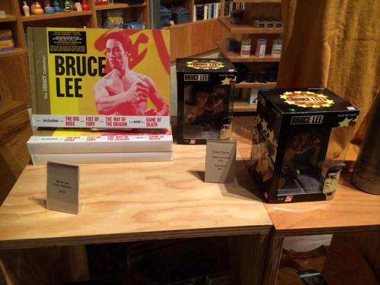 The Signature Theatre Company Bookstore is currently stocking Bruce Lee themed merchandise including Bruce Lee DVD sets, Bruce Lee Dolls and Bruce Lee/Kung Fu themed T-shirts. Photo by Lia Chang