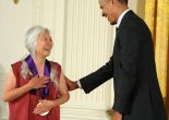 President Barack Obama presents the National Medal of Arts to writer Maxine Hong Kingston in a White House ceremony on July 28, 2014. Photo by Jocelyn Augustino.