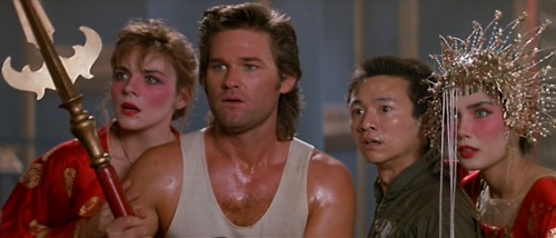 Kim Cattrall, Kurt Russell, Dennis Dun and Suzee Pai in Big Trouble in Little China (1986) (c) Twentieth Century Fox