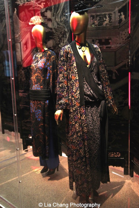 Yves Saint Laurent haute couture ensemble from 1977–78 of Polychrome printed black silk damask.