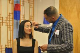 Lia Chang gets the vip treatment from Blue Michael of Blue Michael Cosmetics at the 72 Hour Shootout Launch party at The Korea Society in New York on June 4, 2015. Photo by Lia Chang
