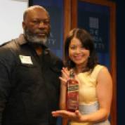 Asian American Film Lab president Jennifer Betit Yen presented silent auction winner Patrick Coker with the Shootout embossed bottle of Johnny Walker donated by Diageo, at the 72 Hour Shootout Launch party at The Korea Society in New York on June 4, 2015. Photo by Lia Chang