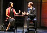 Xi Yan, Vice Minister of Culture, played by Kara Wang, explains a situation to American businessman Daniel Cavanaugh, played by Matthew Jaeger in East West Players production of David Henry Hwang’s Chinglish. Photo courtesy of East West Players